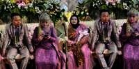 Viral Sambil Gendong Anak Istri Tua Temani Suami Dampingi Istri Muda di Pelaminan, Netizen Penasaran Alasan Nikah Lagi