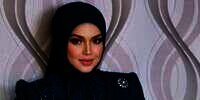 Viral Video Siti Nurhaliza Gunakan Tas Dior Buat Penyangga Handphone