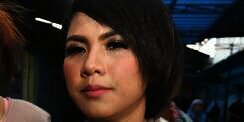 Evelyn Pajang Foto Masa Lalu