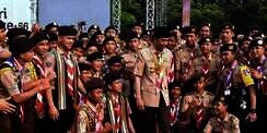 Sosok di Balik Foto Jokowi dan Anggota Pramuka