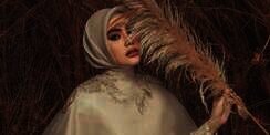 Hamil Besar, Intip Gaya Kartika Putri dengan Baju Renang Syar'i