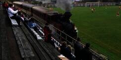 Dikira Editan, Kereta Api Melintas di Depan Tribun Stadion Sepakbola Ini Nyata!