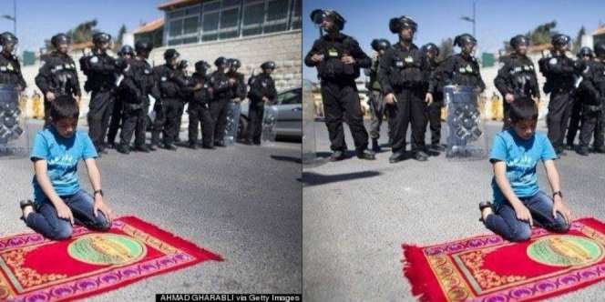 Heboh Foto Bocah Palestina Salat di Depan Tentara Israel