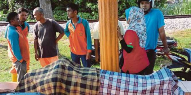 Syahadat Tukang Sampah Sebelum Nafas Terakhir