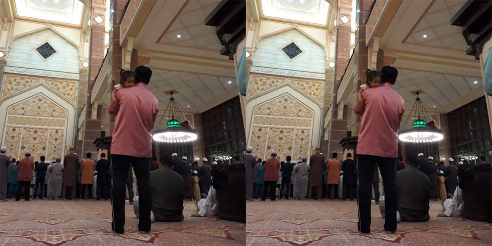 Bersandar di Bahu Sang Ayah, Bocah Ini Diam