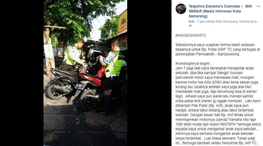 Polisi yang membantu Tedjo mengantarkan anaknya ke sekolah