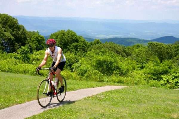 Cara mengecilkan paha dan betis dengan bersepeda