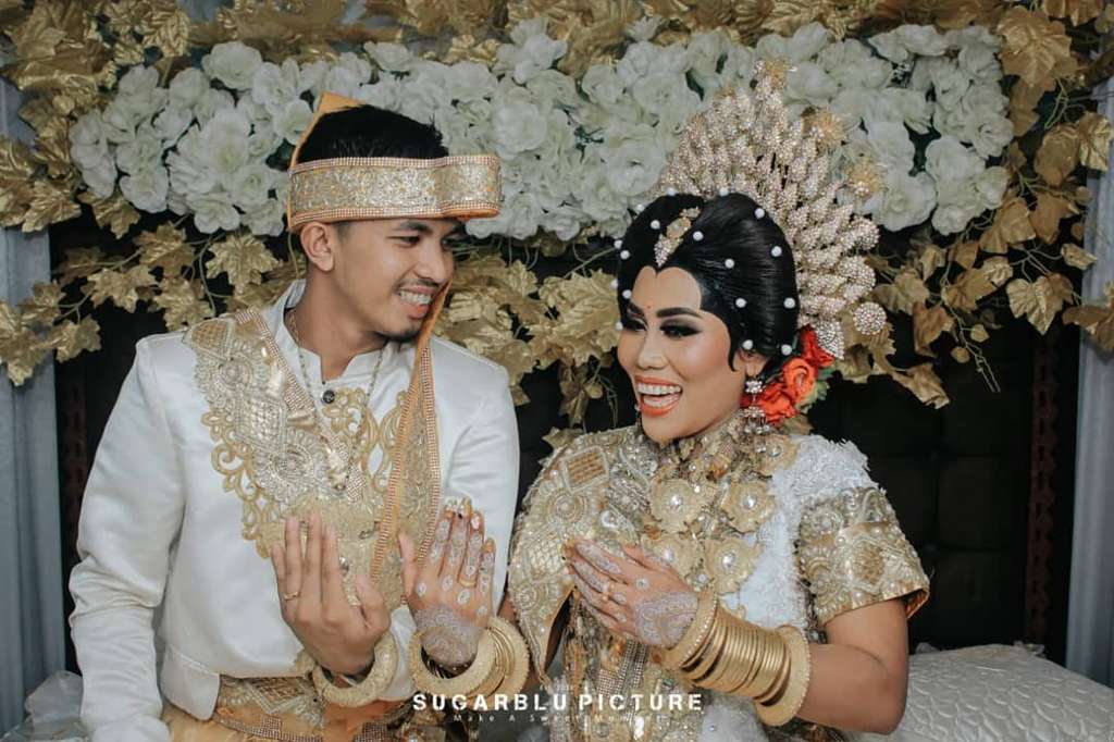 Evi Masamba dan suami