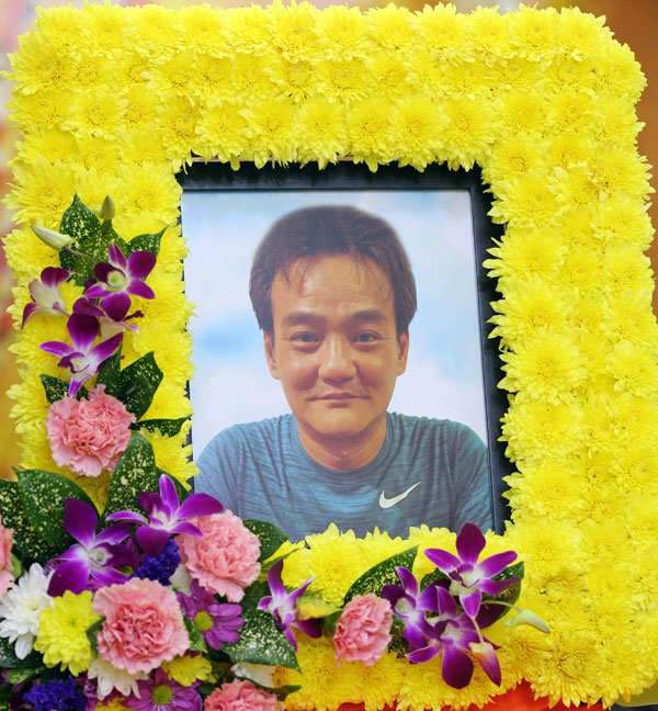 Ayah yang memberikan wasiat ke anak-anaknya (Foto: China Press)