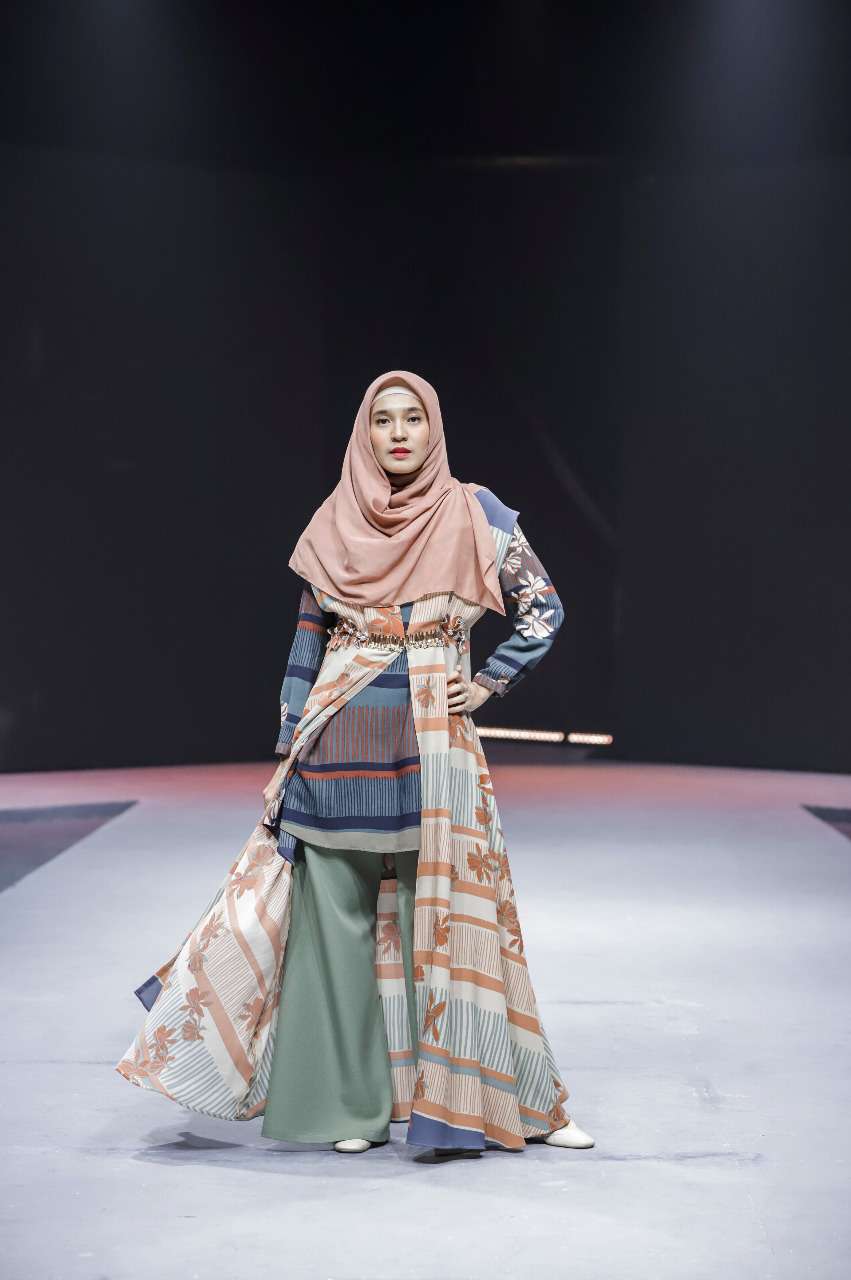 Dhini Aminarti
