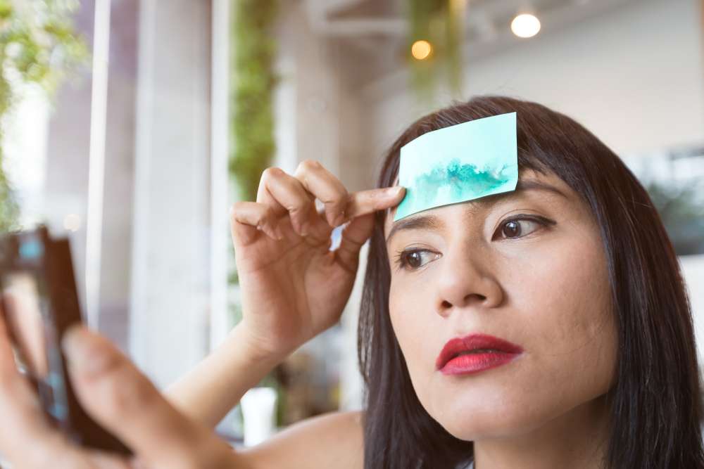 Memakai Blotting Paper