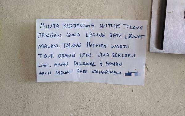 Pesan ancaman dari tetangga.
