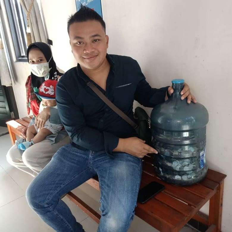 Pembelian Motor Dengan Uang Koin