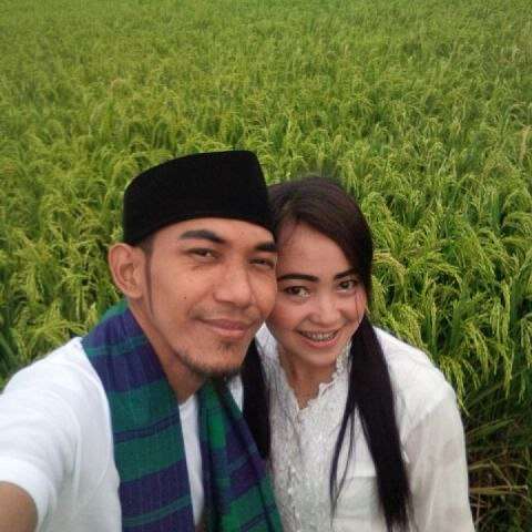Mpok Alpa bersama suami