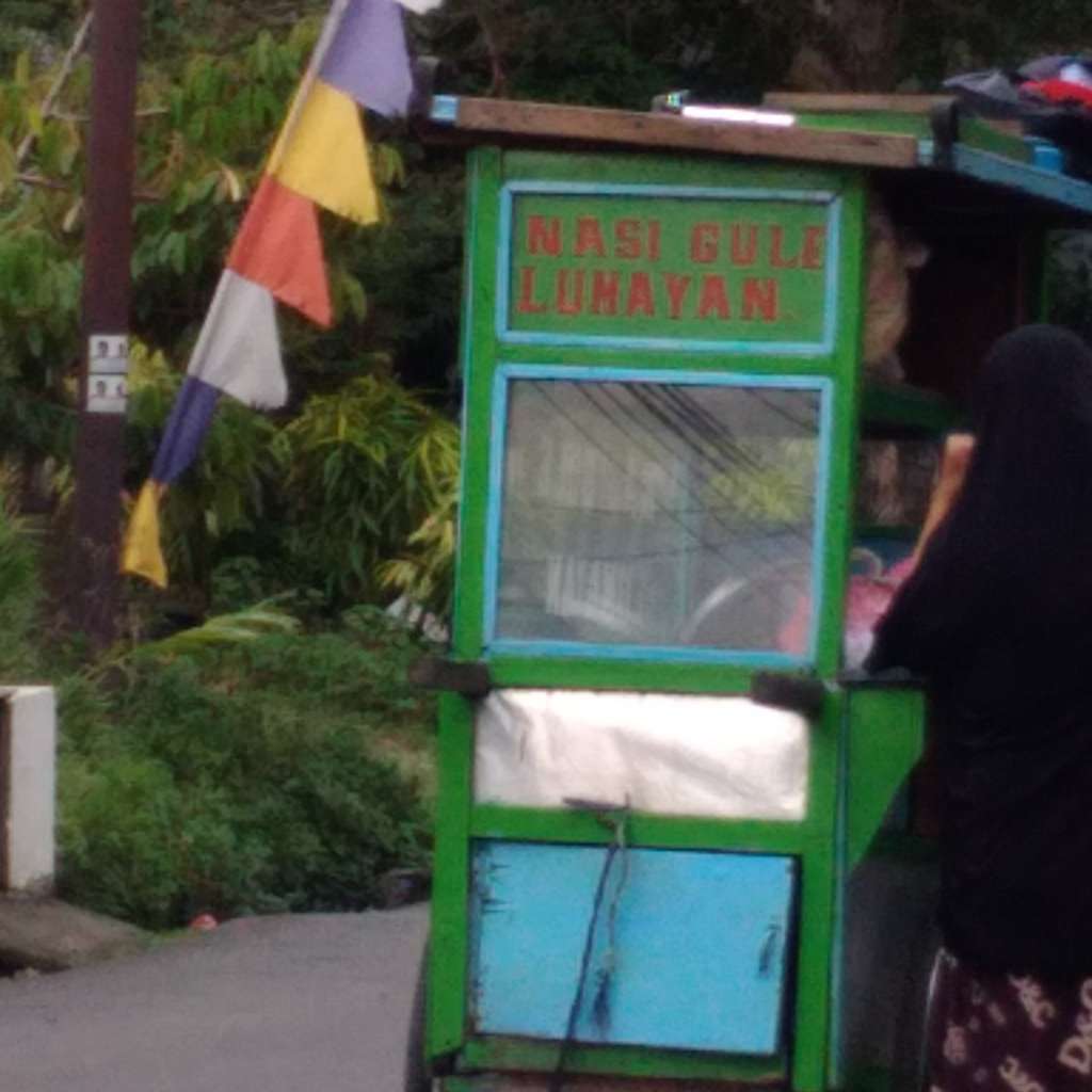 Tulisan nyeleneh di gerobak pedagang viral twitter