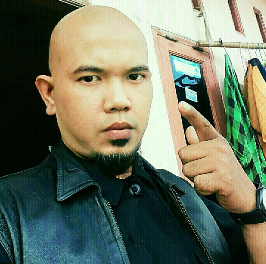 Driver Ojol yang mirip Ahmad Dhani