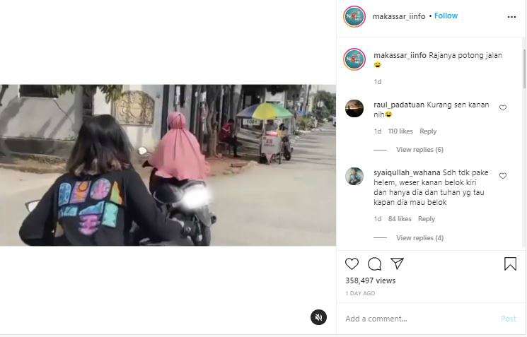 Seorang ibu memotong jalan pengendara lain.