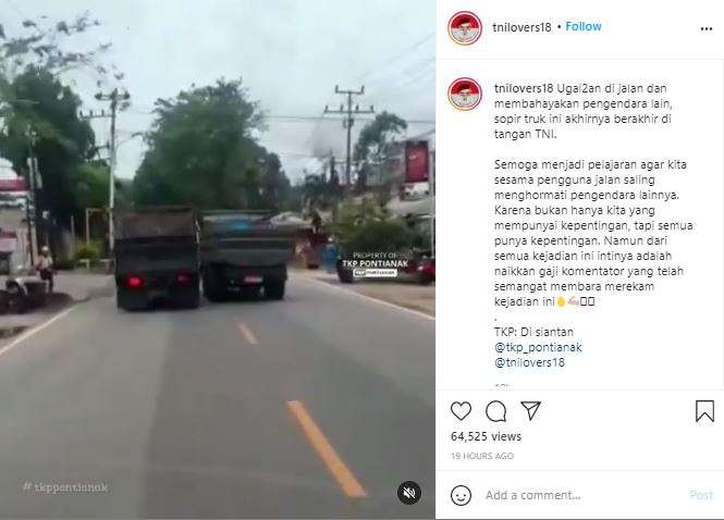 Truk TNI pepet sopir truk lain di jalan.