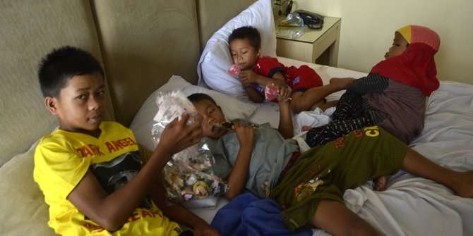Tasripin dan adik adiknya