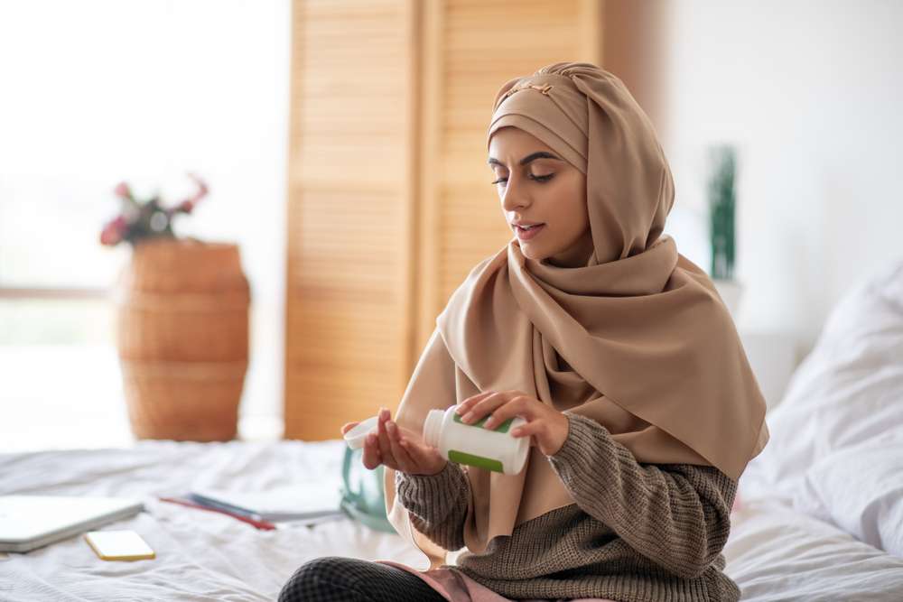Mengonsumsi Obat