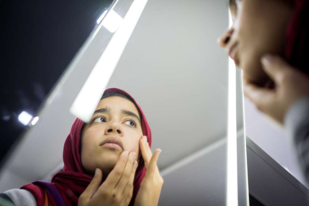 Memiliki Wajah Berjerawat