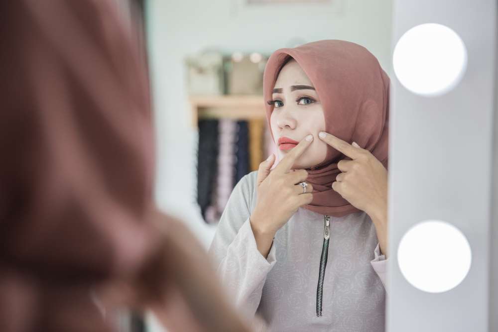 Memiliki Wajah Berjerawat
