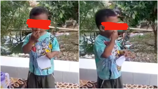 Bocah makan kertas