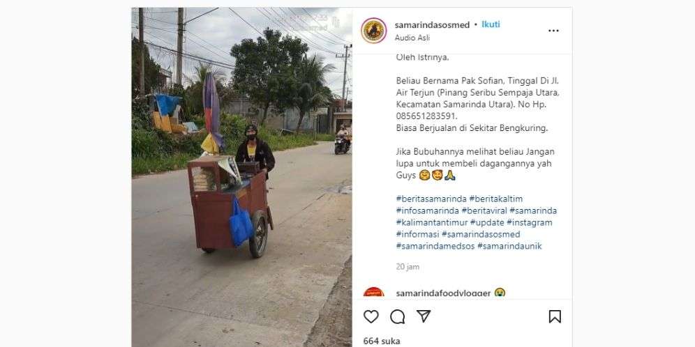Seorah ayah berjualan sambil menggendong anak di Samarinda