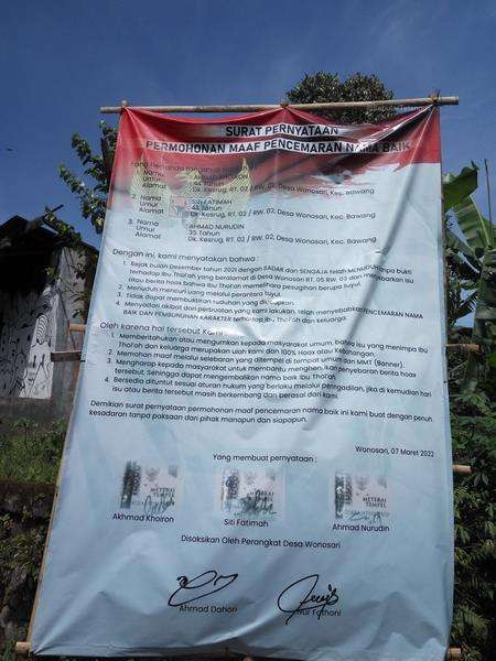 Baliho permintaan maaf karena tuduh tetangga pelihara tuyul.