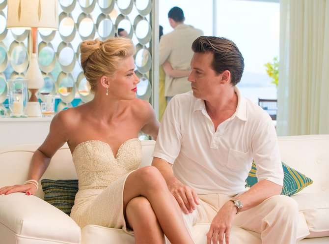 Heard dan Depp saat berakting dalam film Rum Diary Heard dan Depp saat berakting dalam film Rum Diary