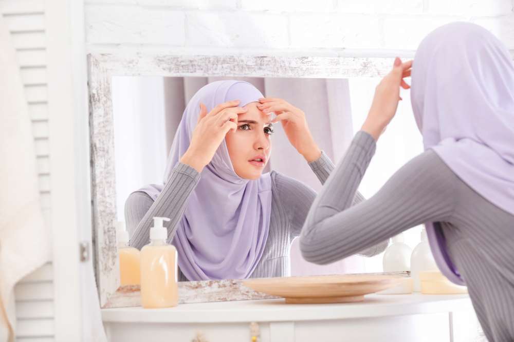 Memiliki Wajah Berjerawat