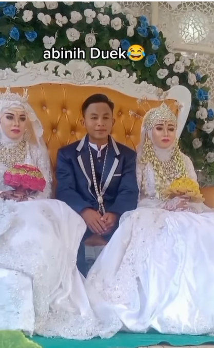 Heboh Pengantin Pria Diapit Dua Wanita di Pelaminan Heboh Pengantin Pria Diapit Dua Wanita di Pelaminan