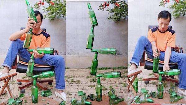 Yekun atraksi menumpuk botol secara unik.