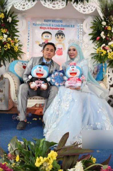 Viral pernikahan mengusung konsep dan tema Doraemon.