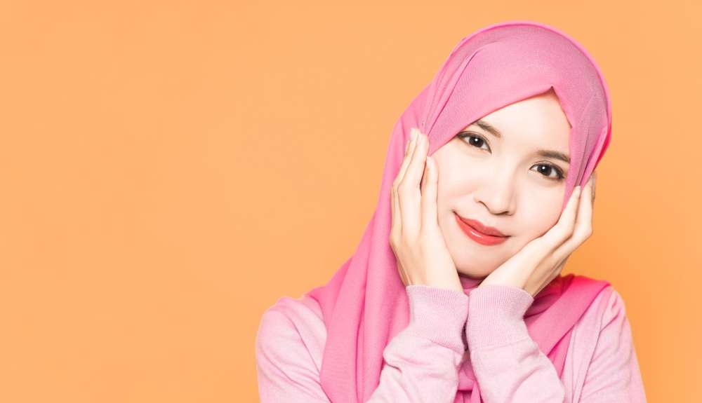Tersenyum