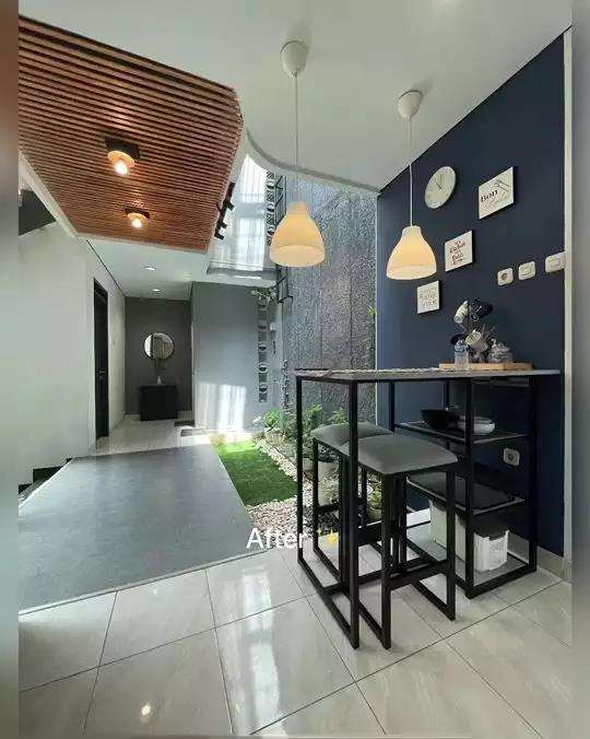 Desain rumah jadul tipe 45 jadi hunian modern bertema industrial dengan desain split level.