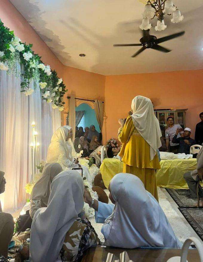 Momen pernikahan mengharukan, pengantin pria tergolek di pelaminan.
