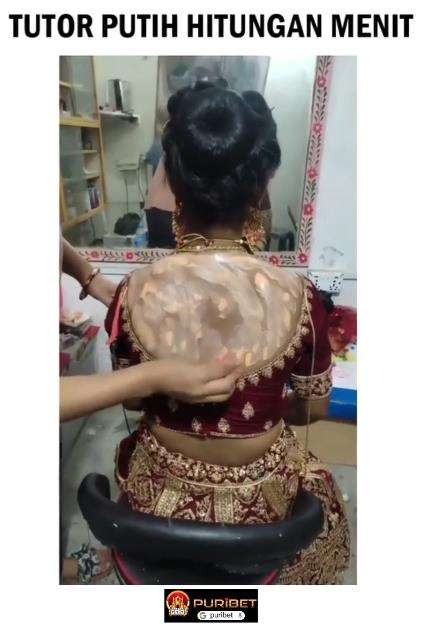 Aksi MUA ratakan warna kulit punggung pengantin ala India biar putih.
