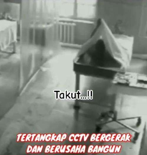 Penampakan jenazah bergerak dan berusaha bangun.