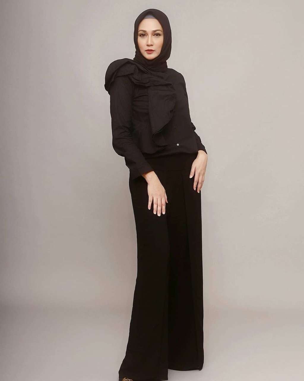 Potret Dina Lorenza