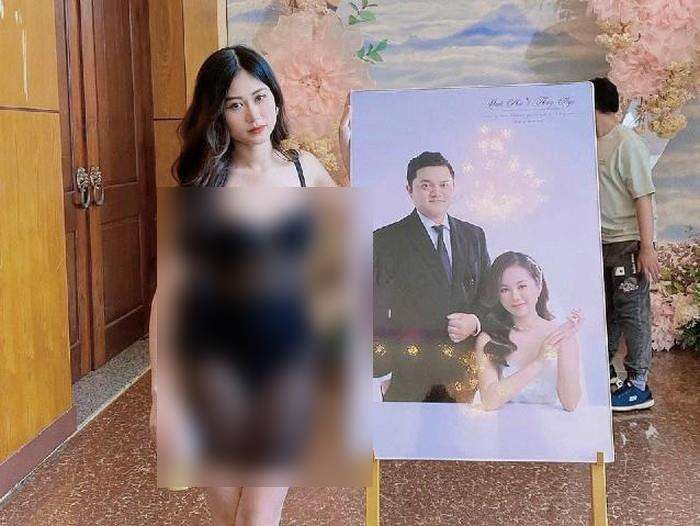 Wanita pakai baju transparan dengan bikini sebagai dalaman di pesta pernikahan.