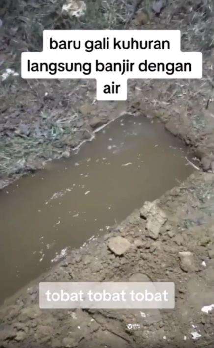 Kuburan baru digali kebanjiran.