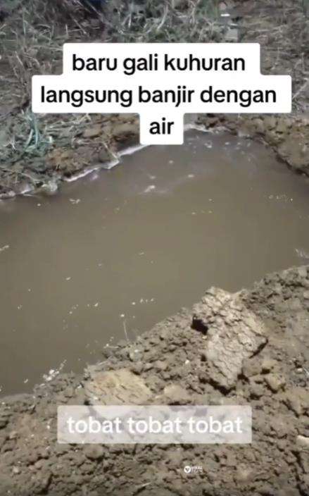 Kuburan baru digali kebanjiran.