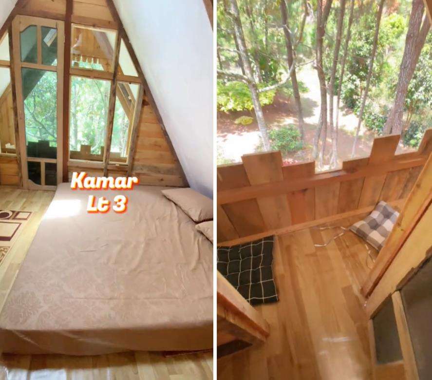 Rumah panggung di tengah hutan.