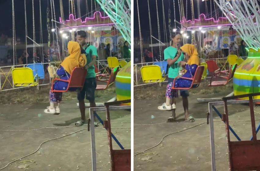 Nenek-nenek nekat bermain wahana ayunan putar di pasar malam.