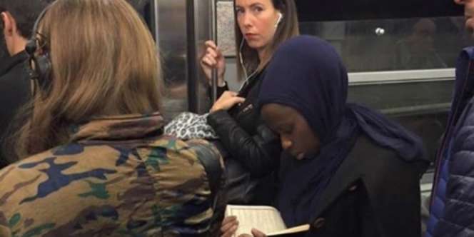 Muslimah Paris Baca Quran di Kereta Getarkan Hati Netizen