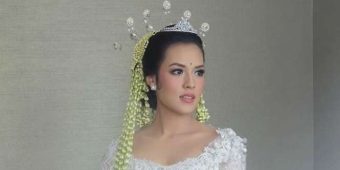 Gaun Pengantin Raisa Tanpa Siger Disorot, Ini Penjelasannya