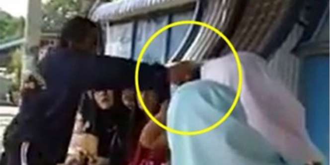Dipukul Karena Tak Berhijab, WNI di Malaysia Lapor Polisi