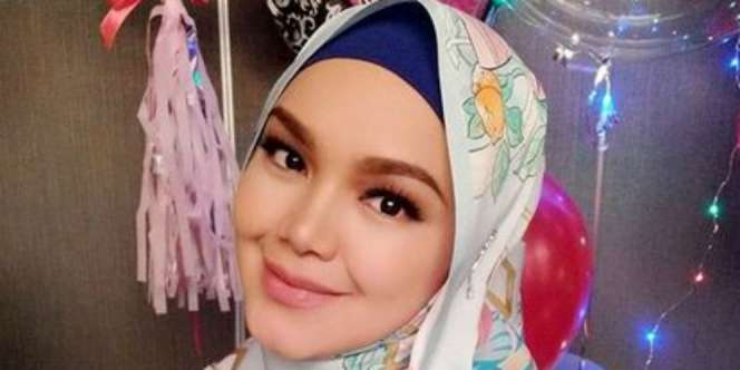 Hamil Anak Pertama, Siti Nurhaliza Makin Mempesona