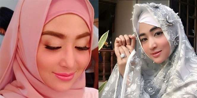 Kerap Tampil Seksi, Dewi Perssik Sering Bepergian Pakai Cadar